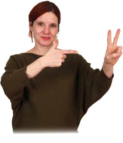 A person holding up two fingers
Description automatically generated